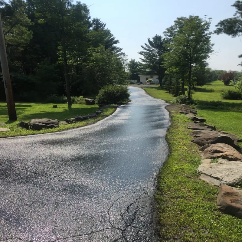 Quality professional sealcoating work on Albany residential driveway