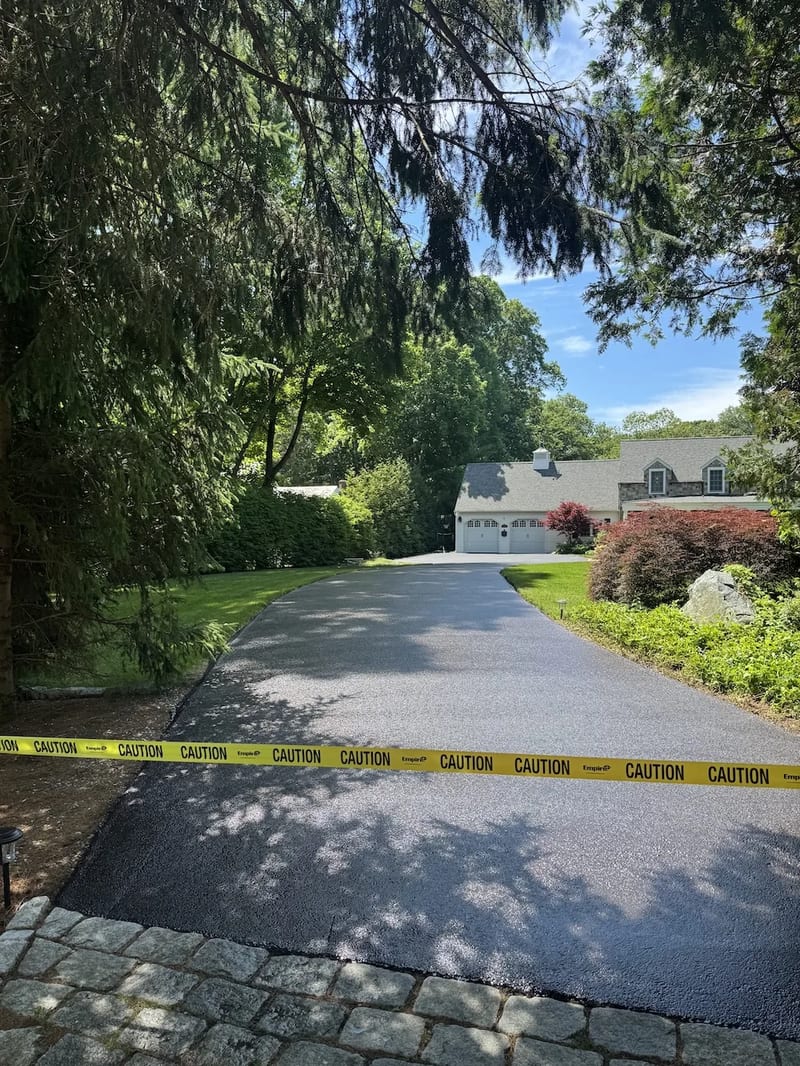 Freshly sealcoated driveway in Rensselaer, NY